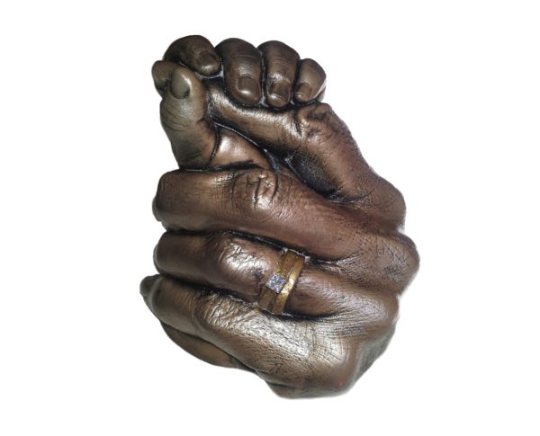 Mother or Father Holding Childs Hand